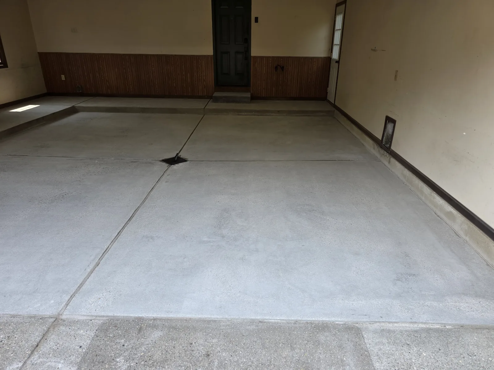 Diamond-ground, moisture-tested and prepped garage concrete before coating - the surface prep step Armorforge never skips